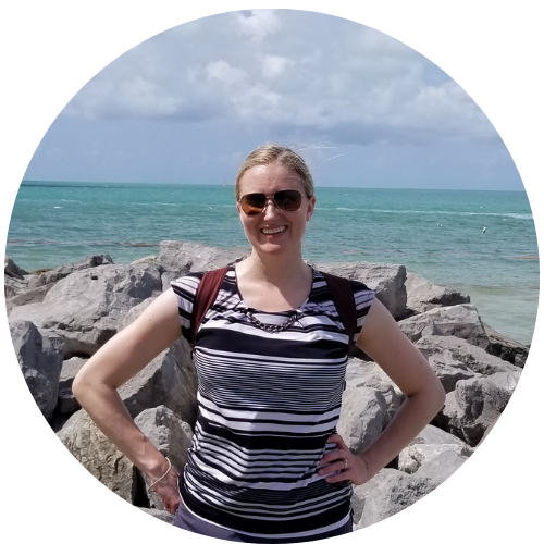 Katherine Sauer standing in front of the gulf of mexico off of florida