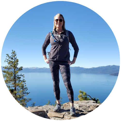 Katherine Sauer standing on a lookout across Lake Tahoe